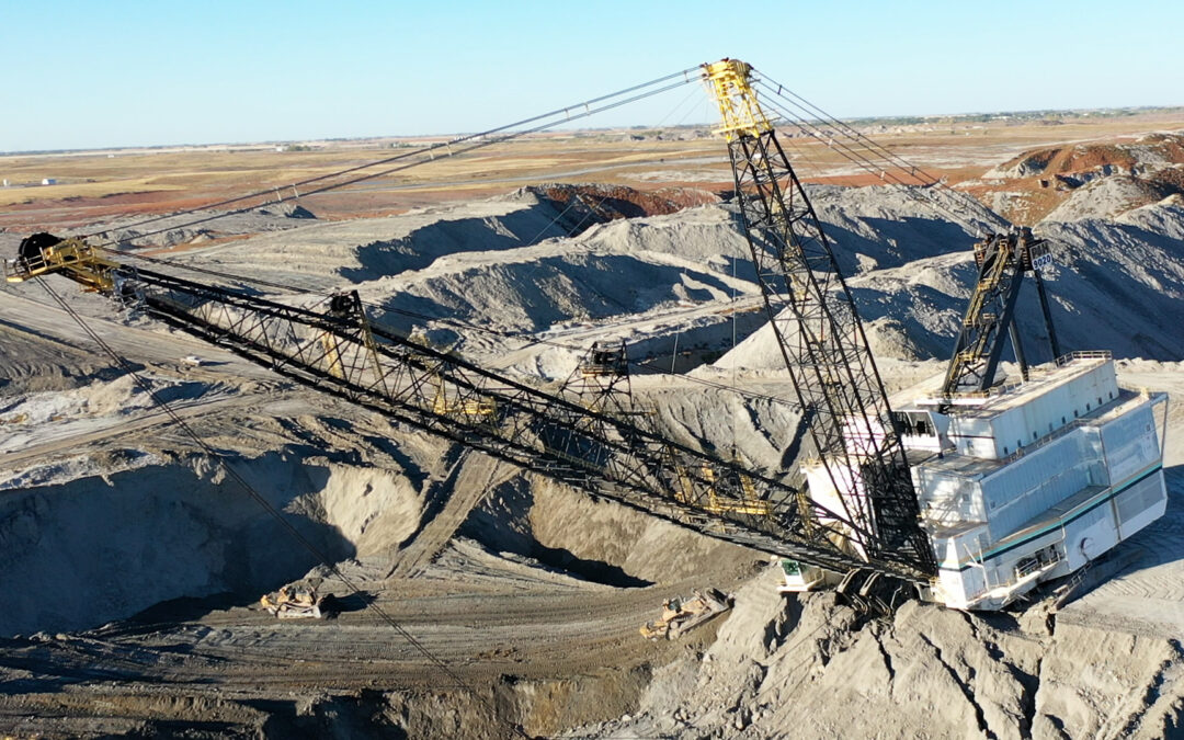 Coal mining dragline in peril after partial wall collapse below it