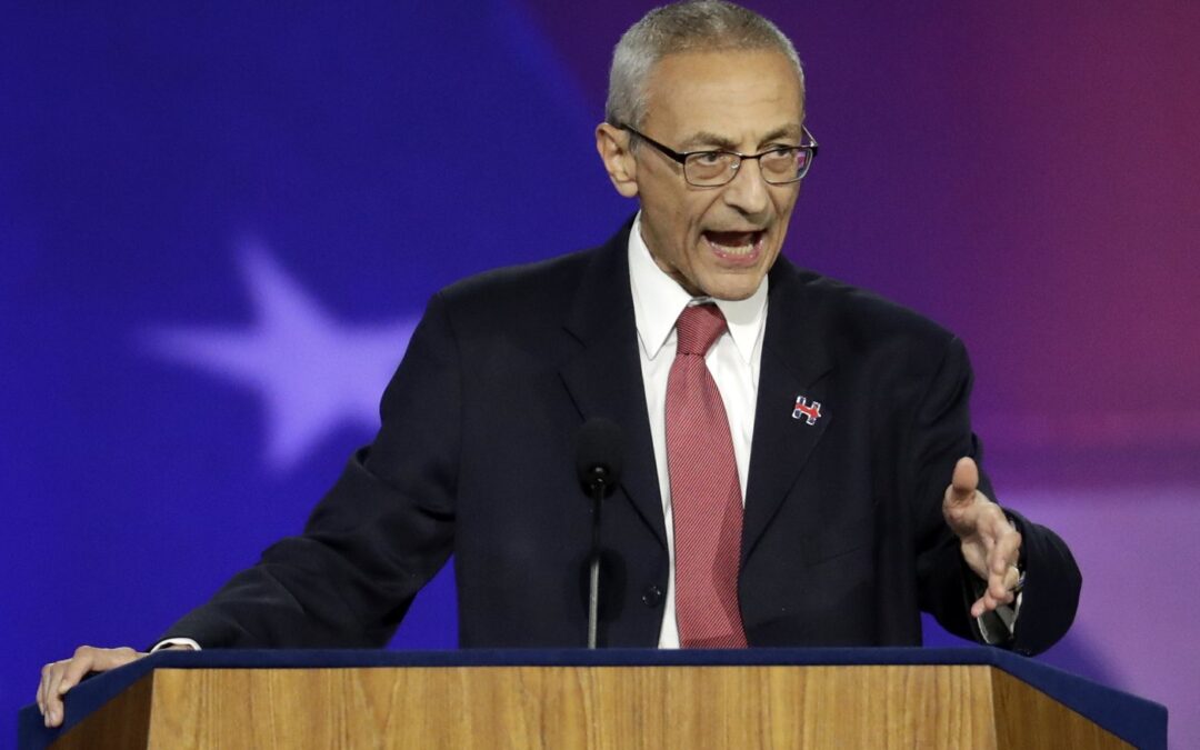 Biden picks White House veteran to run revived climate drive