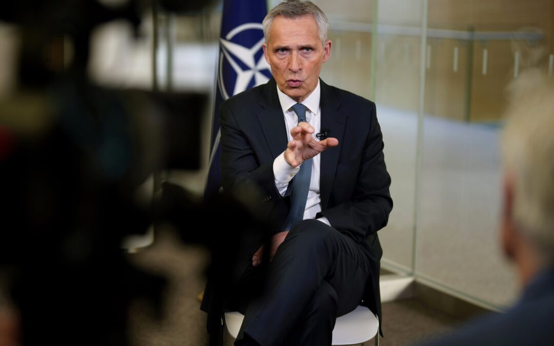 NATO wants to fight climate change. Its chief tells AP the trick is to make armies green but strong