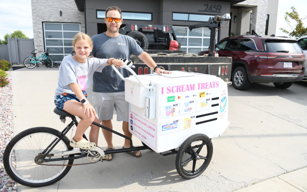 Young entrepreneur learning the ways of business from dad, launches ice cream bike in Estevan